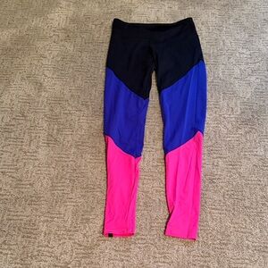 Onzie Black, Blue, and Pink Leggings